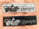 two Chimera PCBs. One in black and white the other in white and black.
