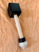 Tuxedo Hephaestus hammer on a brown background.