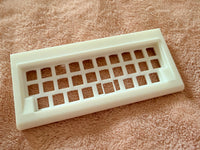 Alpha White case on a brown background.
